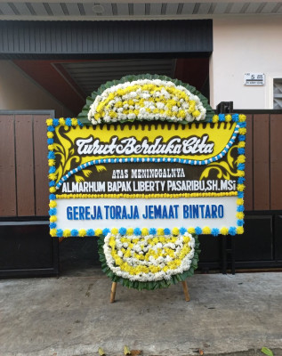 Papan Bunga Duka di Teduh